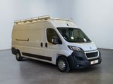 a white van that is parked in a room