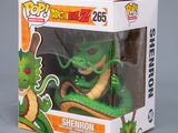 funko pop vinyl figure of a green dragon in a box