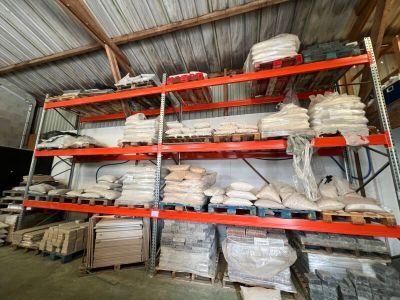 a lot of shelves that have bags on them