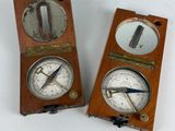 pair of antique wooden compass clocks with mirrors on each side