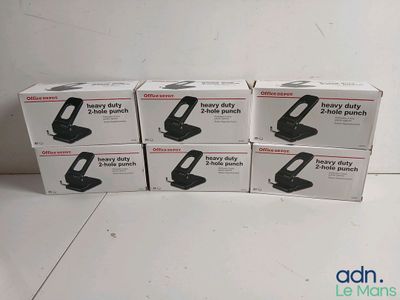 four boxes of black and white items sitting on top of a white floor