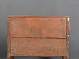 an old wooden table with a drawer on top of it