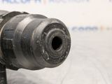 a close up of a drill on a table