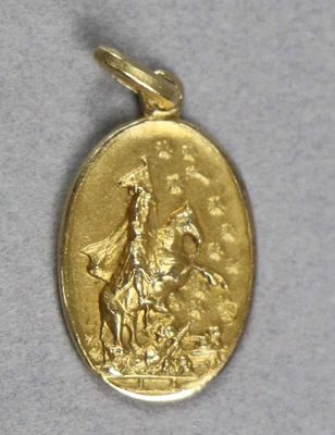 une image représentant une médaille d'or sur laquelle figurent un cheval et son cavalier