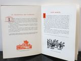 an open book with a picture of a building on it