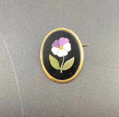 Broche en or jaune 18k 750/° ornée d'une pierre dure stylisa…