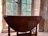 a table that is sitting in front of a window