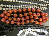 a lot of beads that are laying on a table