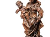 a statue of a woman holding a child on a marble surface