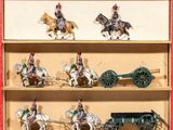 a lot of toy soldiers riding on horses and carts