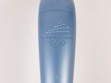 a blue microphone that is sitting on a table
