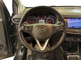 the interior of a car with a steering wheel and dashboard controls