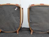 two chairs sitting next to each other on the floor