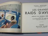 an open book with a picture of people riding on a train