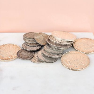 a pile of coins sitting on top of a table
