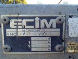 a sign on the side of a machine that says ecim