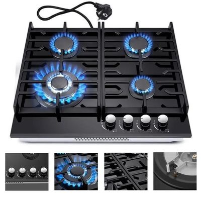 une photo d'une cuisinière à gaz équipée de quatre brûleurs