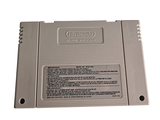 a gameboy game sitting on top of a white table