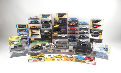 many different types of toy cars and trucks in the box