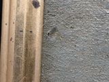 a close up of a piece of metal on a wall