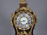 a clock that is sitting on top of a table