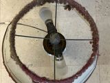 a picture of a glass table with a fan on top of it