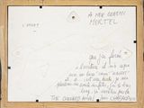 an old envelope with a handwritten message on it sitting on top of a table