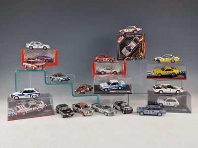 a lot of toy cars on display in a display case