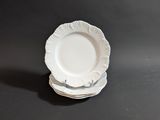 three plates stacked on top of each other on a table