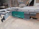 a picture of a table saw in a workshop
