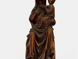 an image of a statue of a woman holding a child