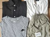 three men ' s shirts in a box with a price tag on them