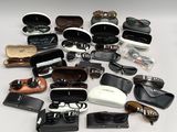 a lot of sunglasses and other items that are on the table
