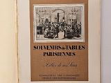 an old book with a picture of a group of people on it
