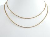 a gold chain necklace on a mannequin mannequin mannequin mannequin mannequin mannequin mannequin mannequin manne