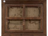 a picture of an old window with a wooden frame