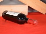 a bottle of wine that is sitting on a table