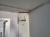 a person standing in front of a door with a sign on it