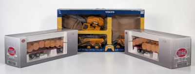 three boxes of toys that are sitting on a table