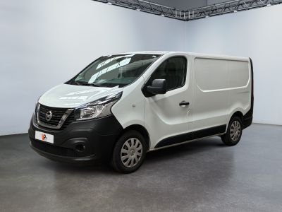 the white van is parked in a large room