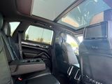 a view of the inside of a car with the sun shining through the window