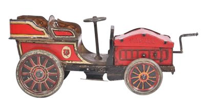 a red and black toy car on a white background