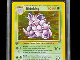 a close up of a pokemon card on a black background