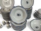a lot of plates and bowls that are sitting on top of each other
