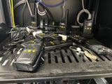 many cell phones that are sitting on top of a table