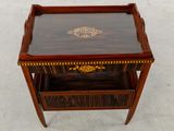 an old wooden table with a drawer on top of it