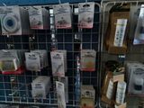 many different items on the rack in the store