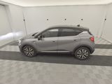 the car is parked in the garage with a checkered floor