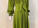 a green dress on a mannequin mannequin mannequin mannequin mannequin mannequin mannequin mannequin mannequin