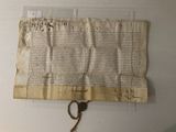 un bout de papier accroché au mur à côté d'une paire de ciseaux